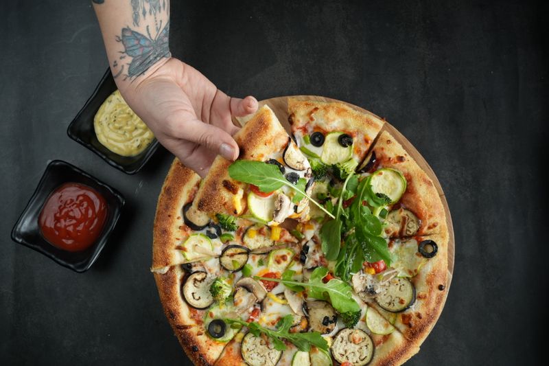 Round table pizza Artisan Supreme — signature pizza with premium toppings