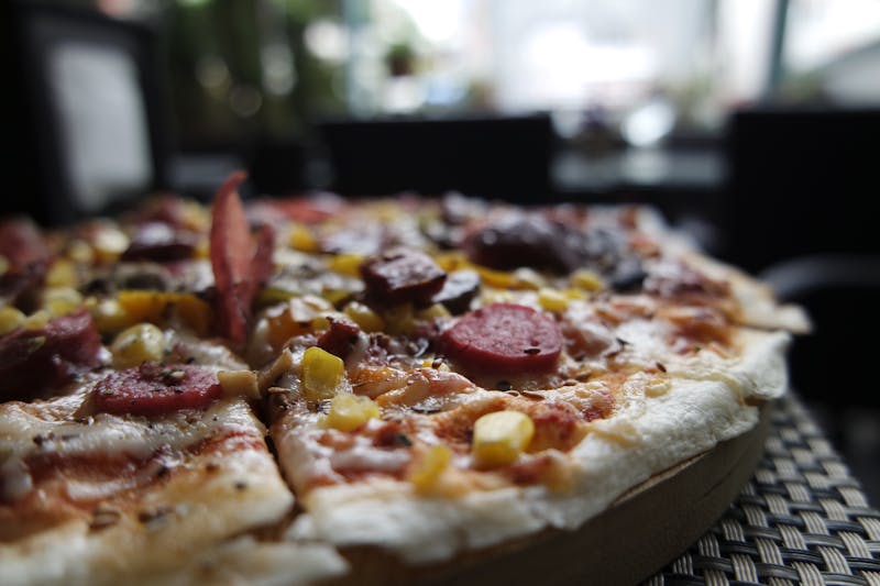 Hawaiian pizza with ham and pineapple